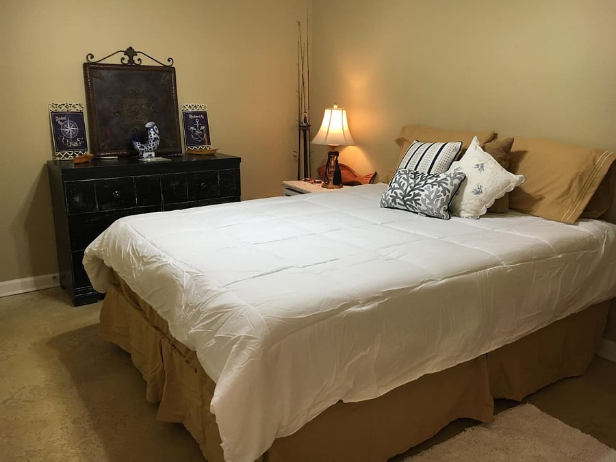 2nd bedroom with a queen size bed includes a flat screen TV not pictured