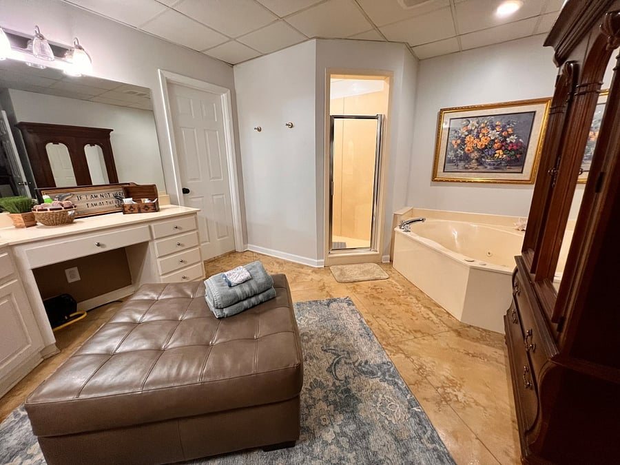 Larger master bath with jetted garden tub and an oversized walk-in shower