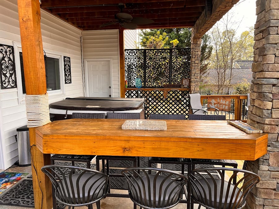 High-top bar that seats 6 between the Grill and hot tub