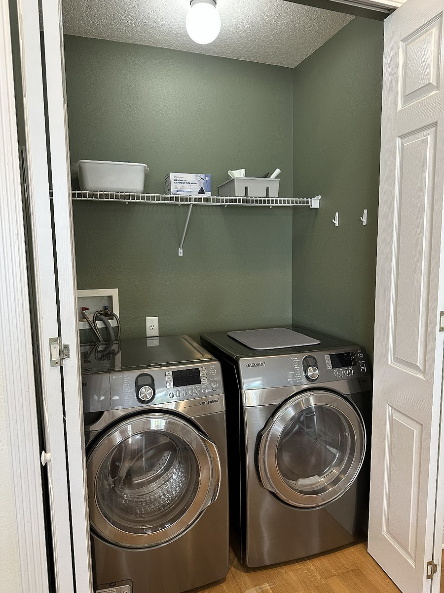 Laundry closet in kitchen area