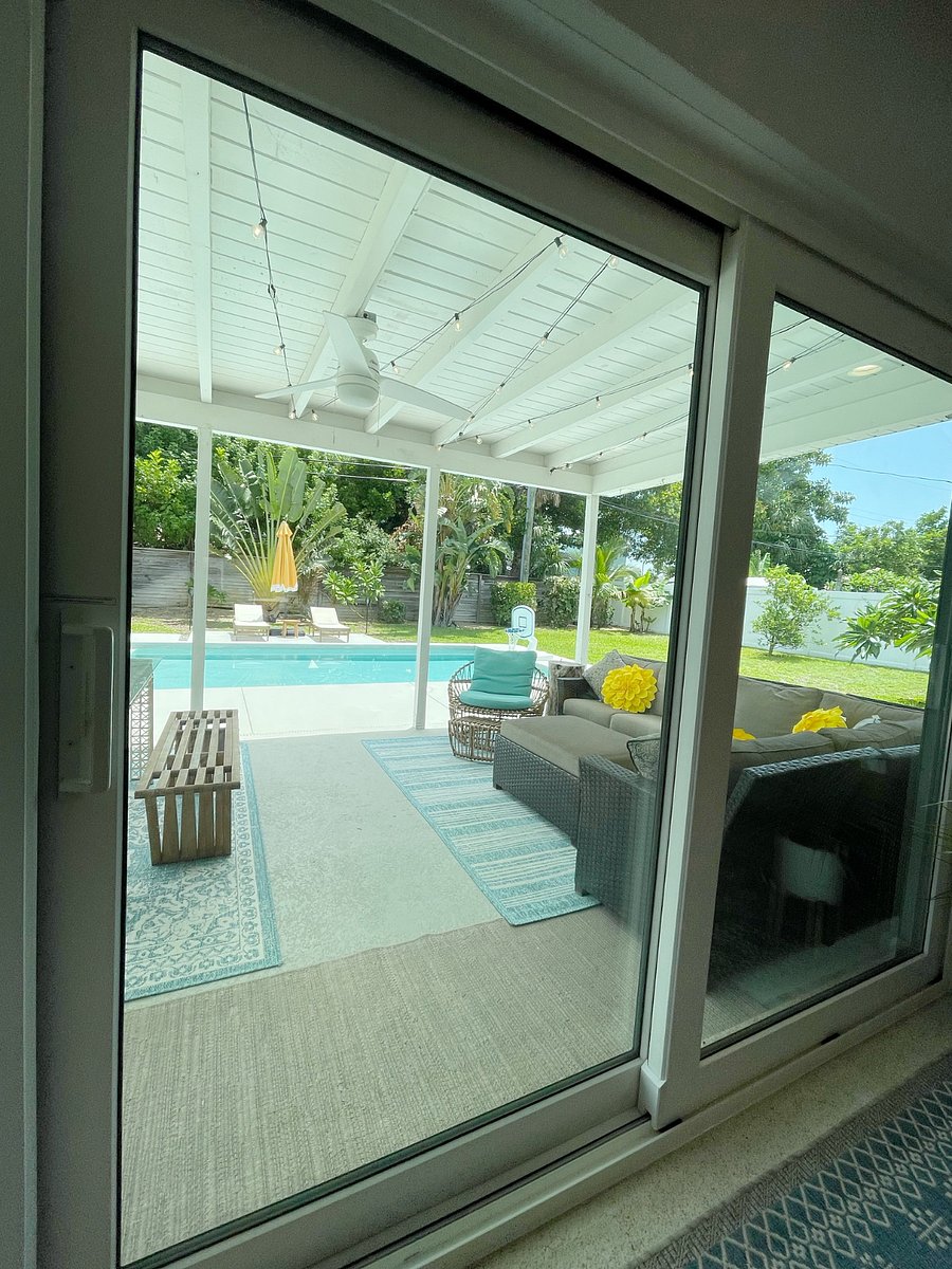 View through sliding doors outside to backyard 
