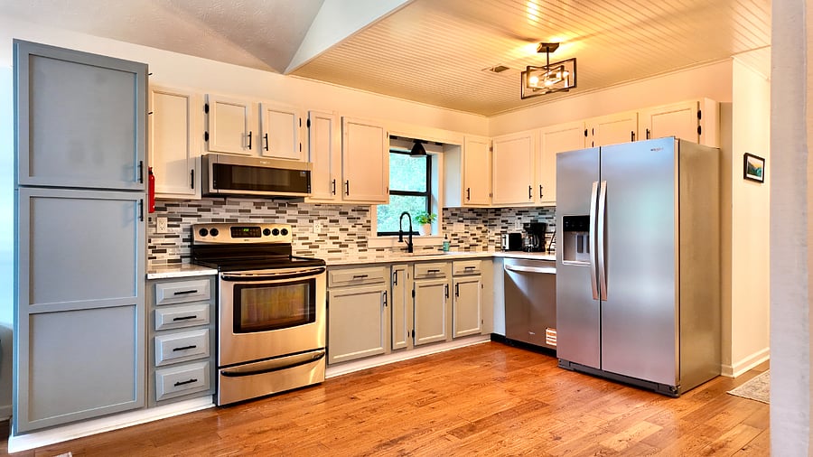 Full sized kitchen with newer stainless steel appliances