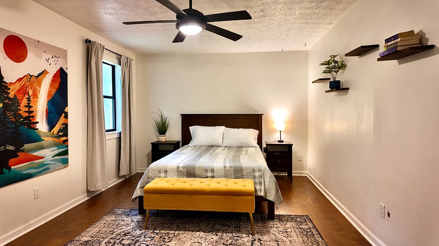 Primary bedroom: Queen sized memory foam mattress, blackout curtains, Smart TV, Dresser