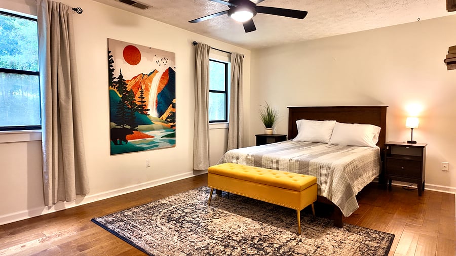 Primary bedroom: Queen sized memory foam mattress, blackout curtains, Smart TV, Dresser