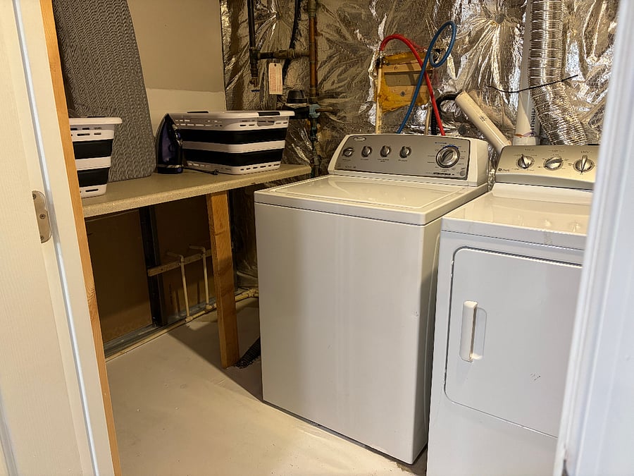 Laundry Room; ironing board, iron, clothes baskets; clean towels, wash cloths 