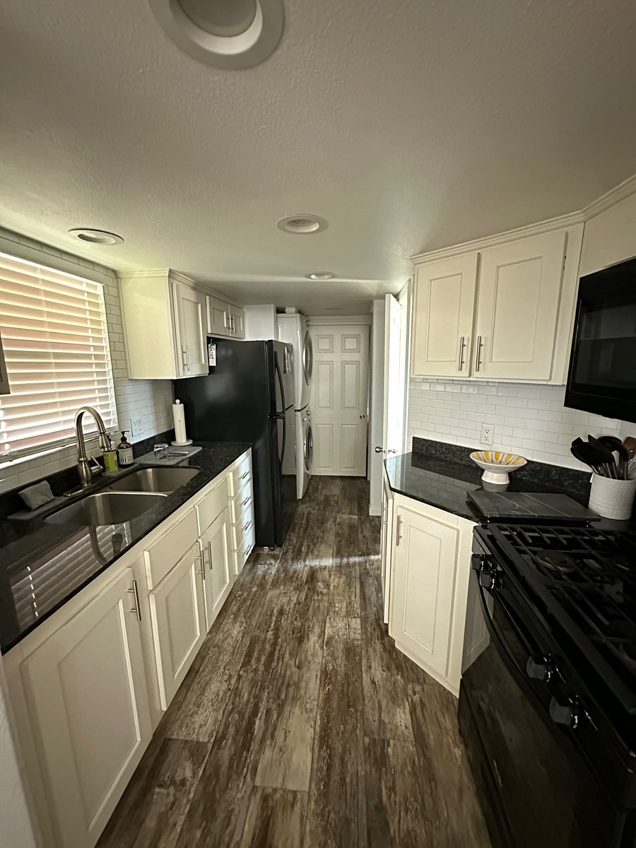 Complete kitchen with residential refrigerator 