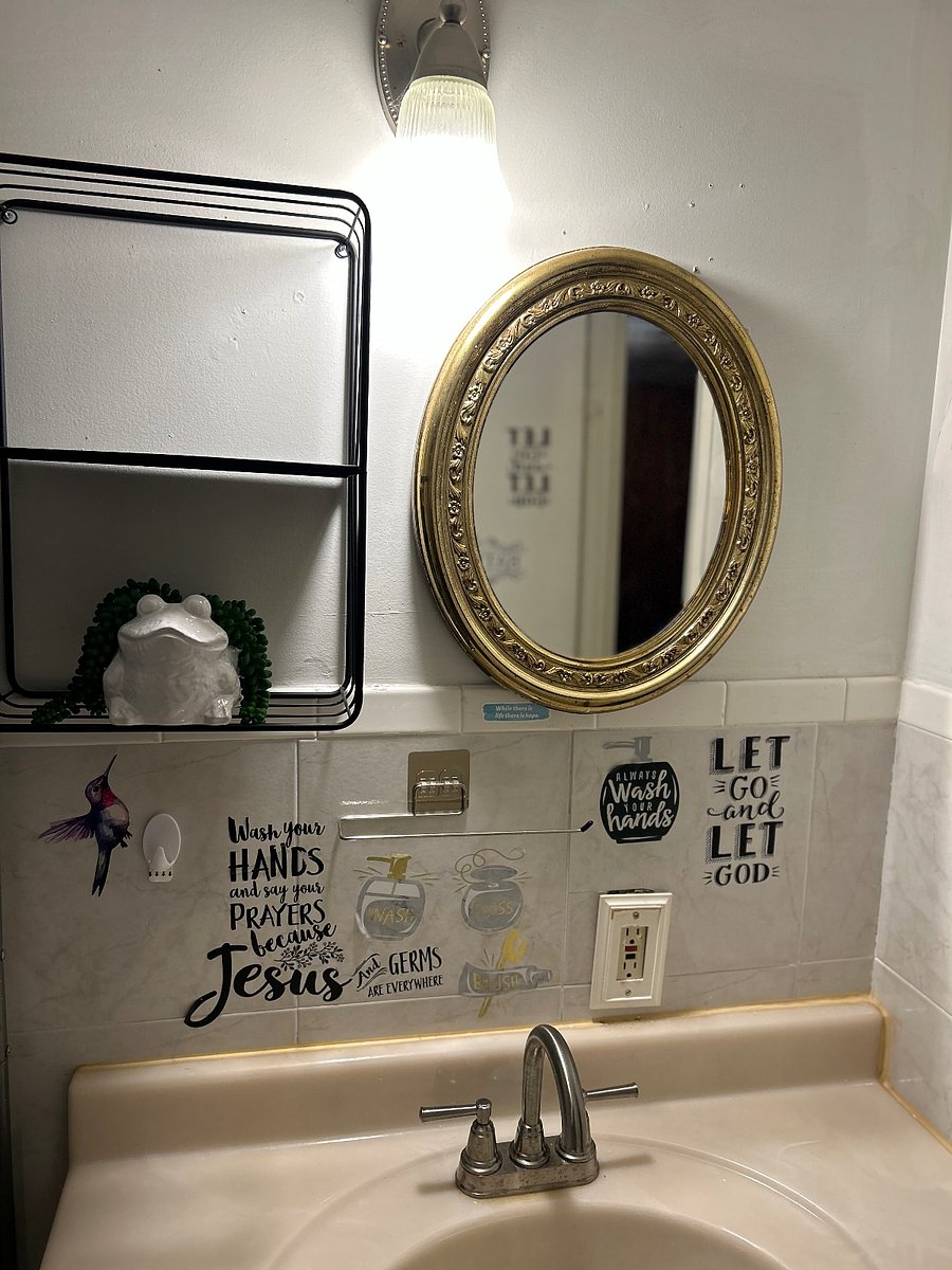 Bathroom mirrow and vanity area