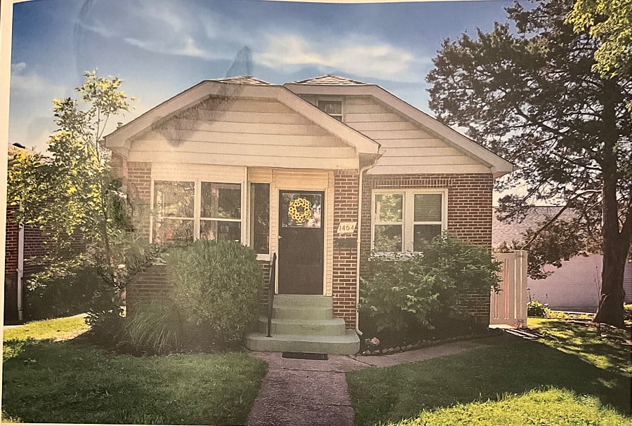 Lots of green space. Front door leads to a large enclosed front porch and additional door enters the home with extra security locks.