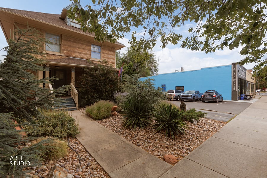 A beautiful, mature xeriscaped front yard, thoughtfully landscaped and water-wise for an eco-friendly welcome.