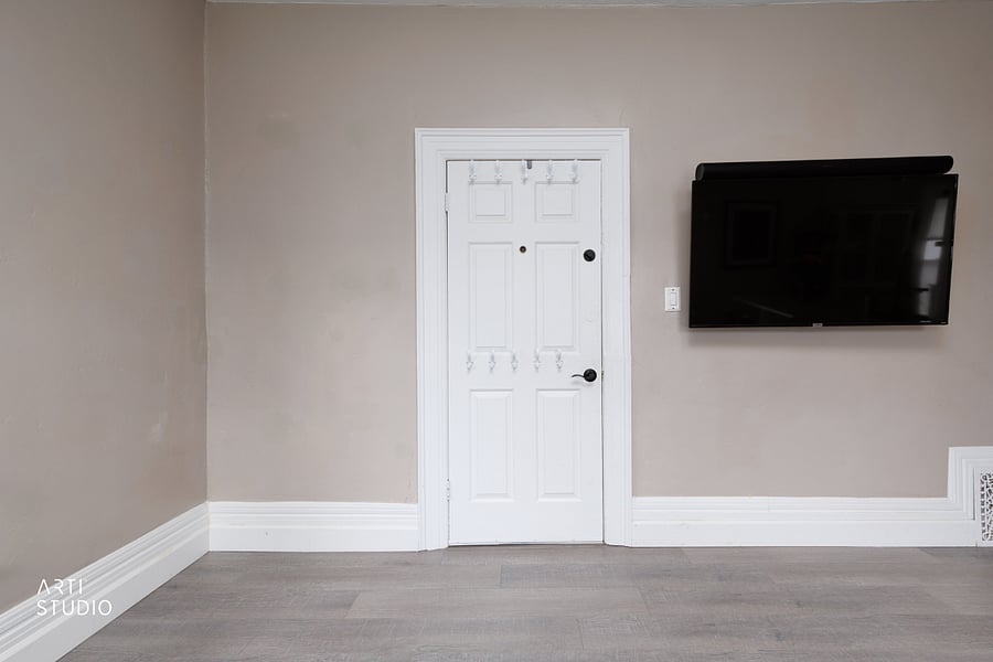 Just inside the front door, hooks give coats, bags, and winter gear a place to land the moment you walk in.