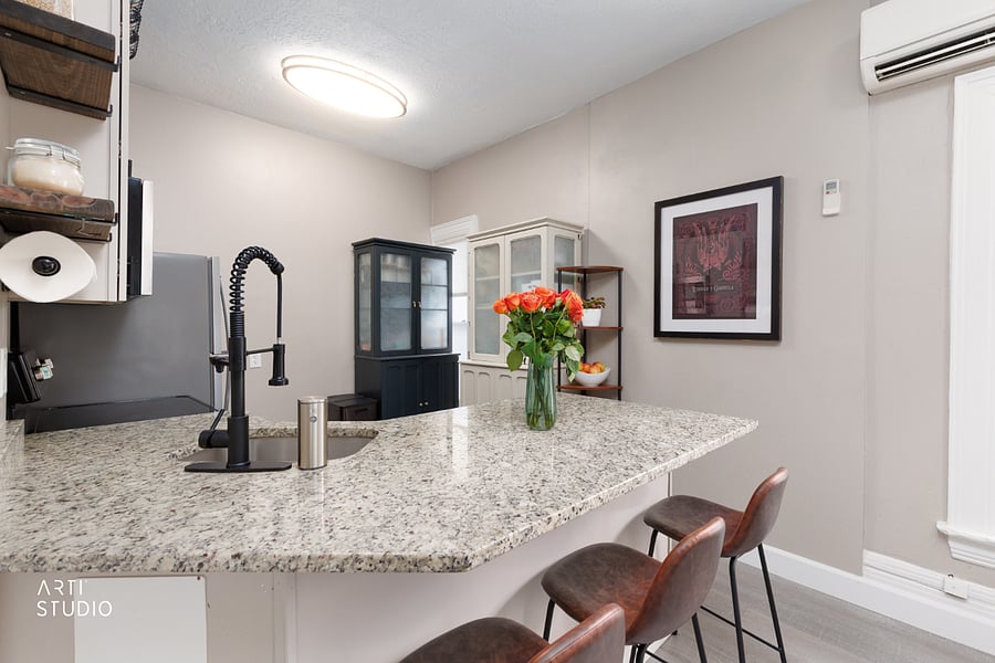 Looking over the sink, with a reverse-osmosis filter for clean, great-tasting drinking water, and a hanging banana holder by the paper towels that keeps the counters clear.