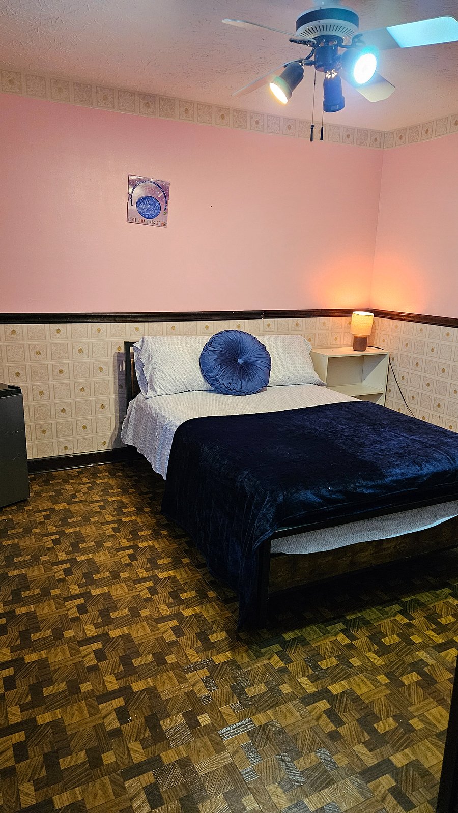 Second bedroom upstairs has a full bed set with mini refrigerator, shared bathroom. $700 monthly...