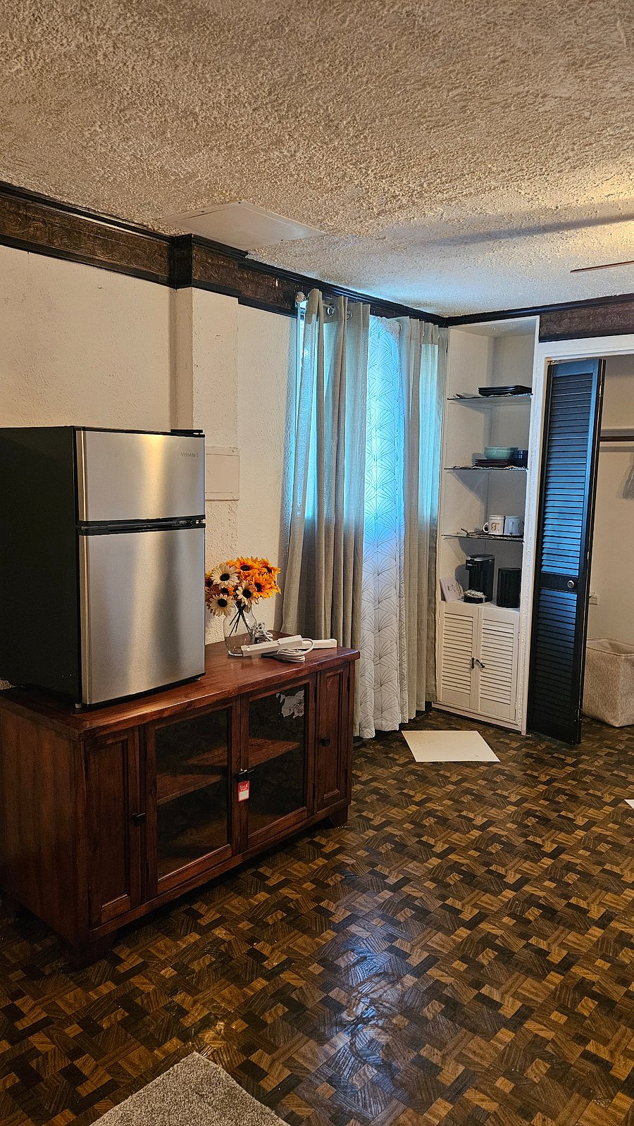 Downstairs kitchenette - mini refrigerator, coffee maker, microwave, extract cabinets.