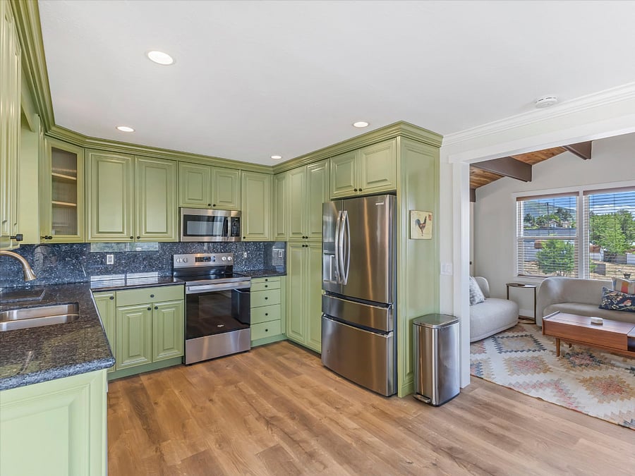 Kitchen facing south east- see the wasatch mountains out living room windows.