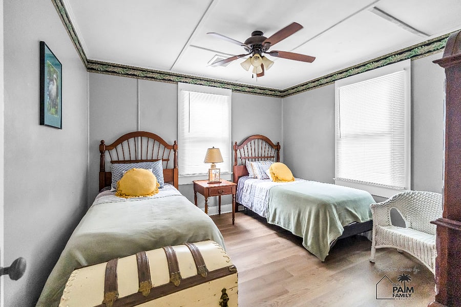 Sunlight streams through multiple windows, bringing warmth and brightness to every part of the Guest Room. A calm, uncluttered space designed to help every guest enjoy a restful and comfortable stay.