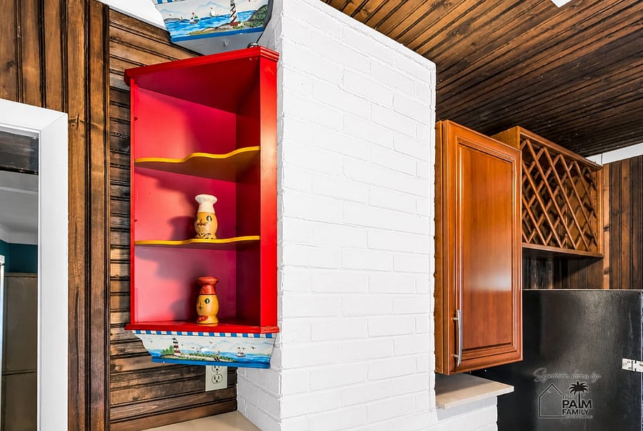 Even the smallest details tell a story. This vibrant shelf, inspired by Florida's coastal landscapes, adds a cheerful splash of colorand the perfect spot to keep your favorite snacks, coffee, or little treats always within reach.