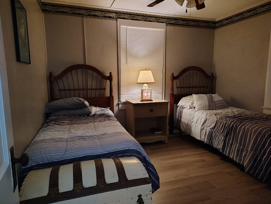 Not every perfect evening begins with perfectly made beds. Sometimes it begins with a warm lamp and a place to truly rest.