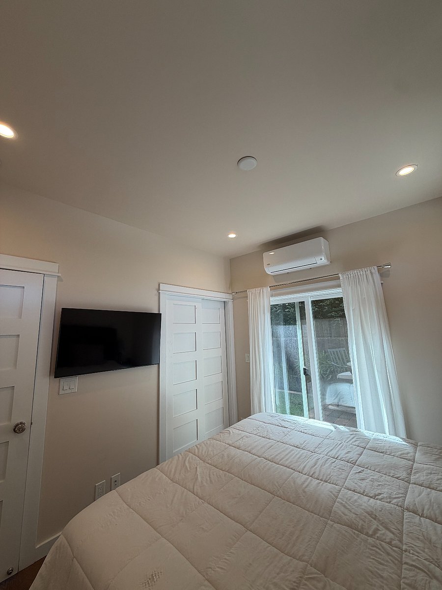 master bedroom with tv