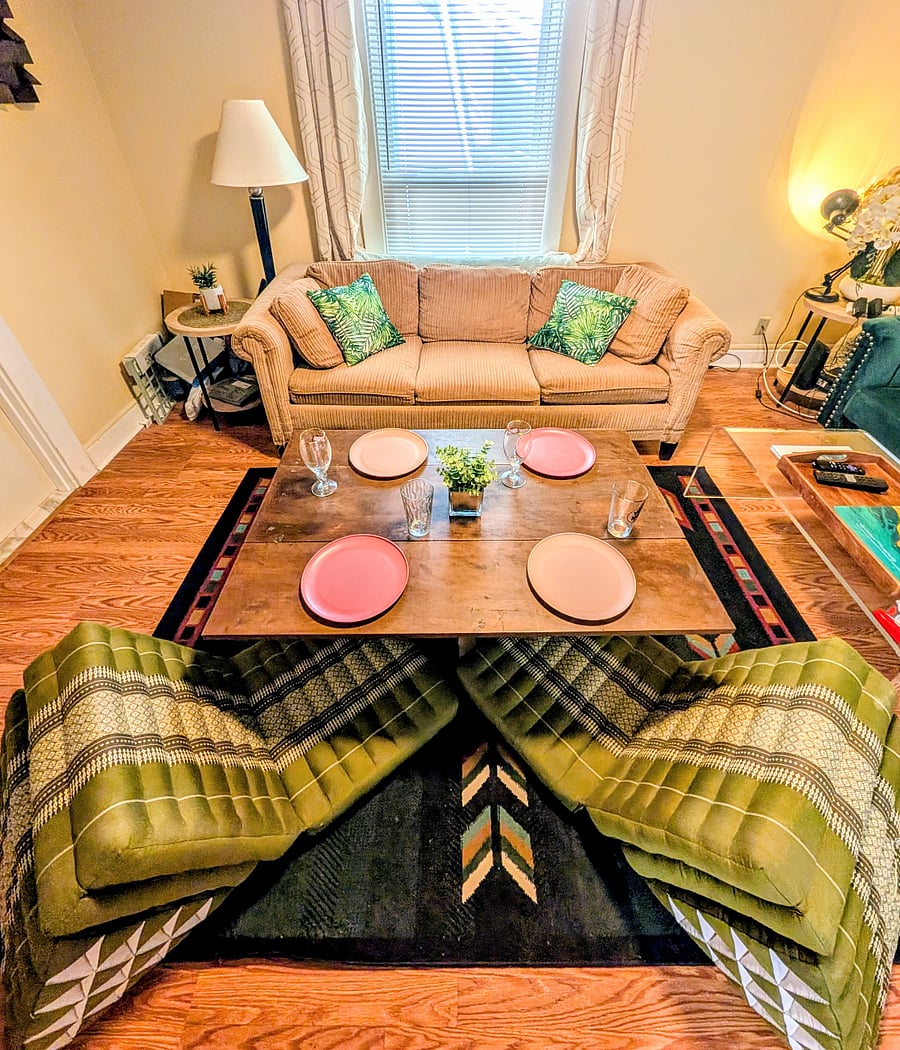 The coffee table folds out to have a fun spot to dine.