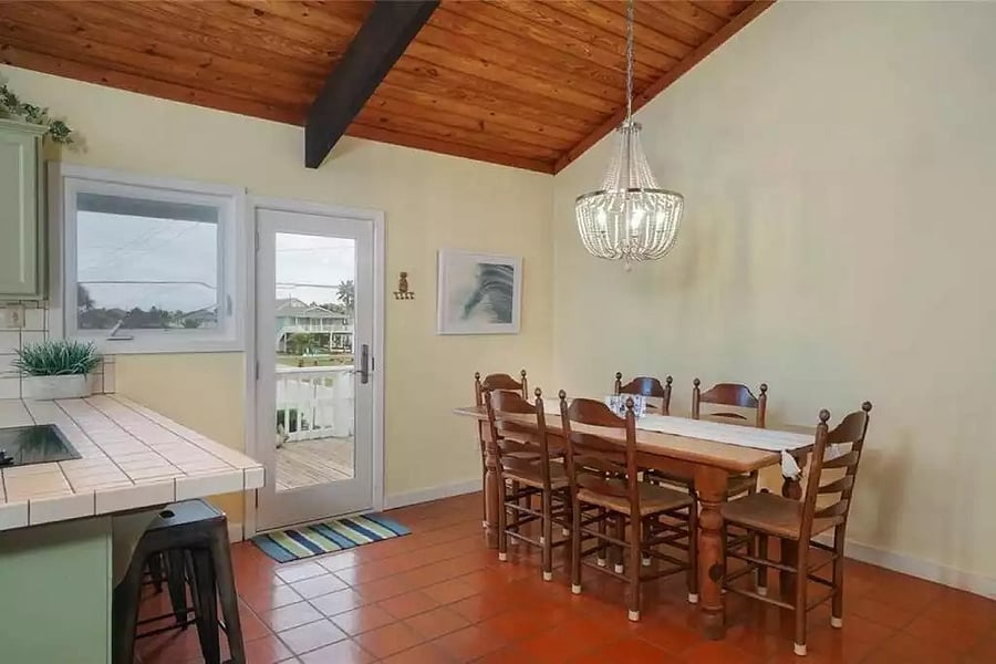 Breakfast table and kitchen bar.
