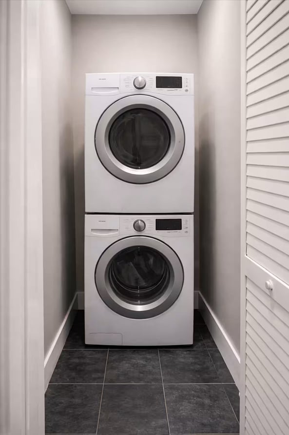 In-unit washer and dryer, stacked and ready pack light, we've got the rest covered.