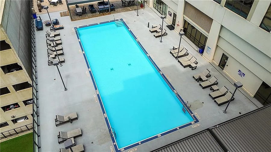 Resort-style pool with stunning city views.