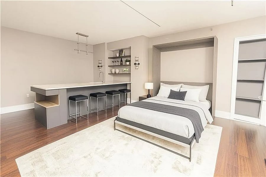 Murphy bed easily transforms the space for extra guests.