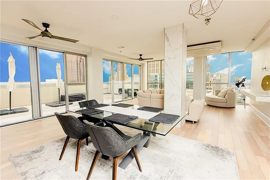 Unwind with panoramic skyline views from the oversized sectional.