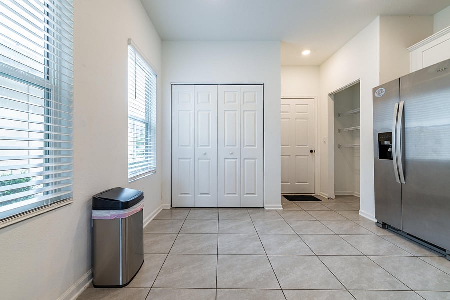 Fully equipped kitchen with stainless steel appliances.