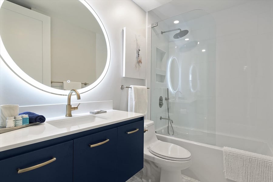 Second bathroom off living space with soaking tub.