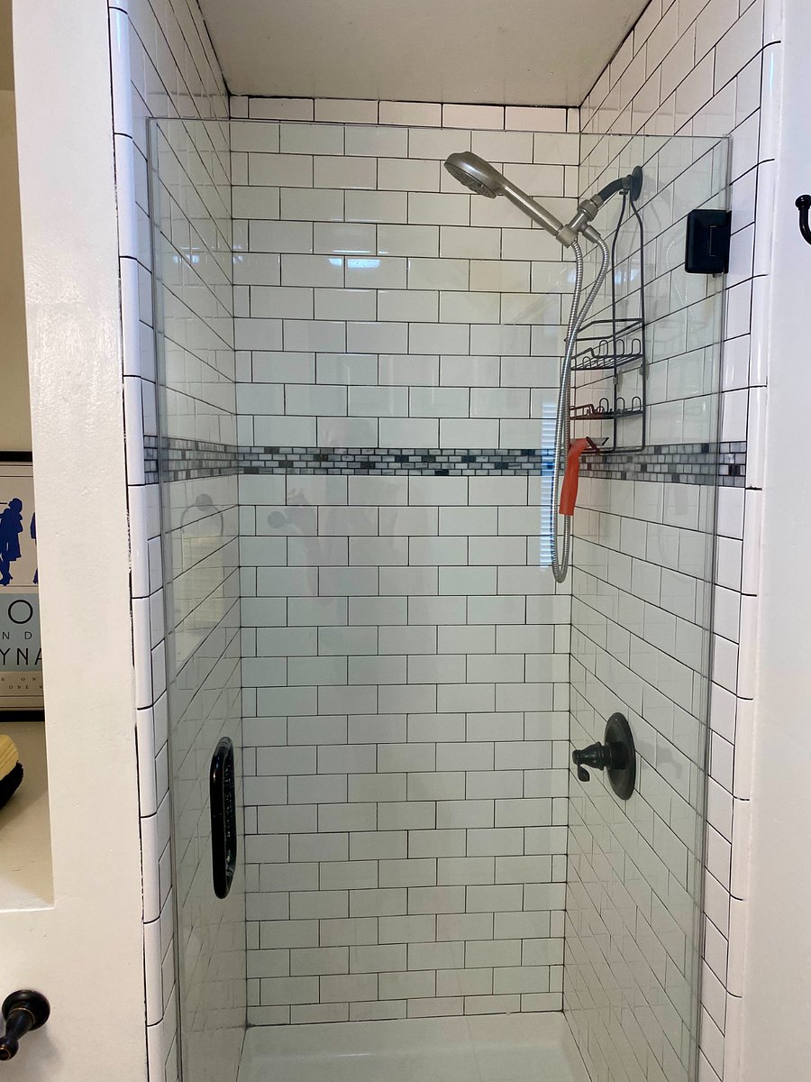 Frameless shower door, rain shower