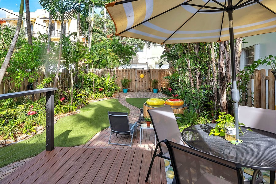 Private, fenced backyard centered around the plunge pool.