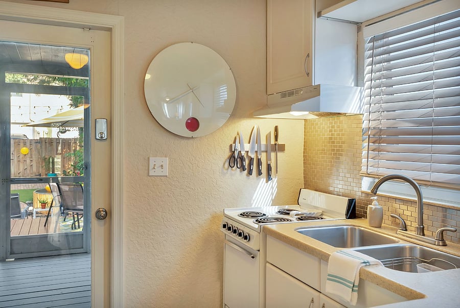 Kitchen counter and sink with plenty of prep space.