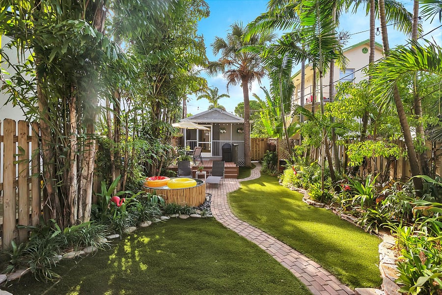 Private, fenced backyard centered around the plunge pool.