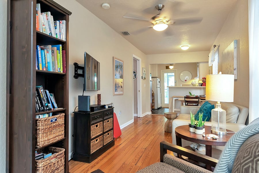 Living area with a sofa and a tv.