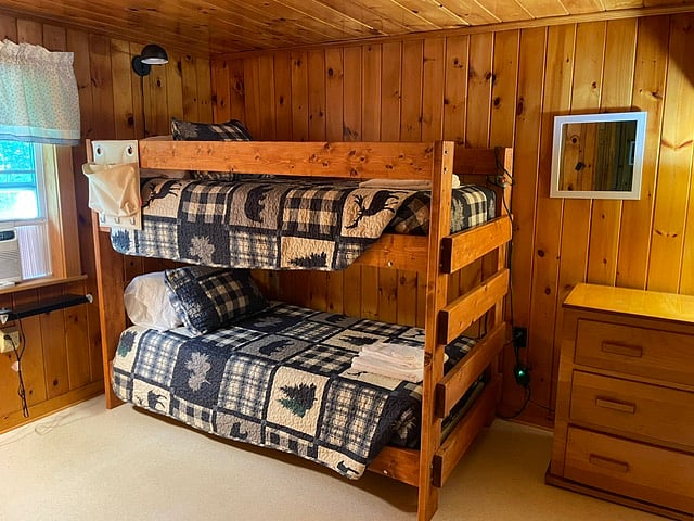 There are 2 bedrooms that are nearly-identical. Each room has twin-sized bunk beds.