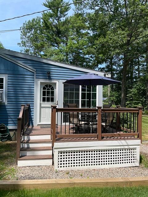 Outdoor deck with umbrella table and chairs
