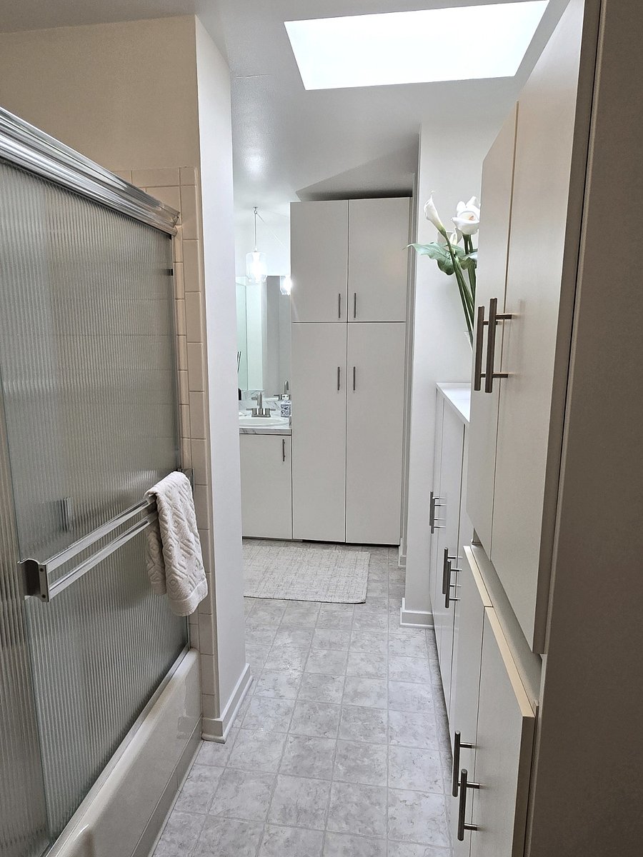 Full bath, plenty of storage, stocked with towels, linens, extra blankets, and pillows.