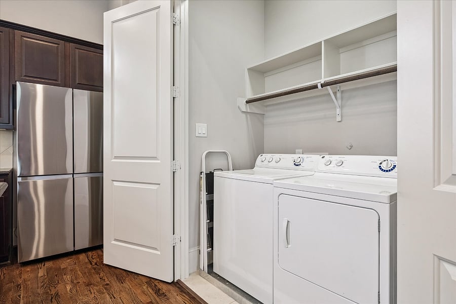 Washer and dryer located just off of the kitchen. 