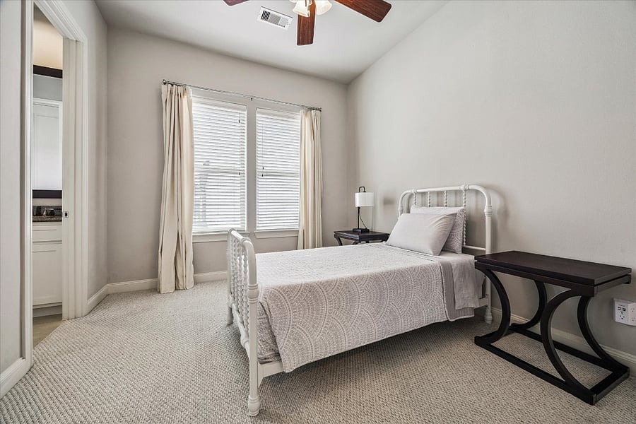 Third floor secondary bedroom with en suite bathroom.