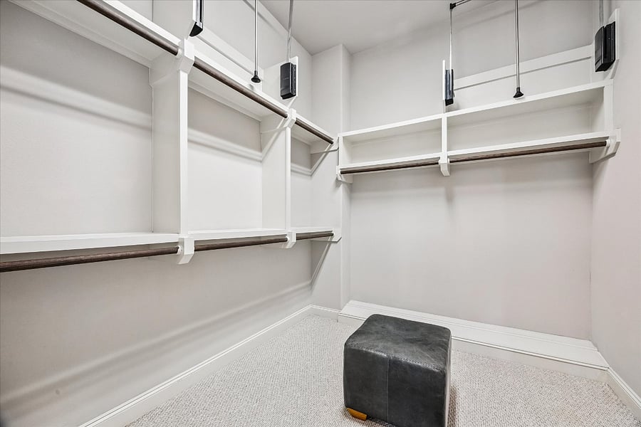 Primary closet with ample storage.