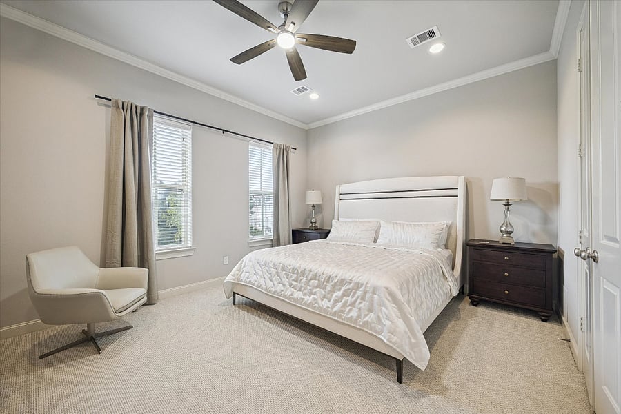 Primary bedroom with loads of closet space and large, ensuite bathroom.