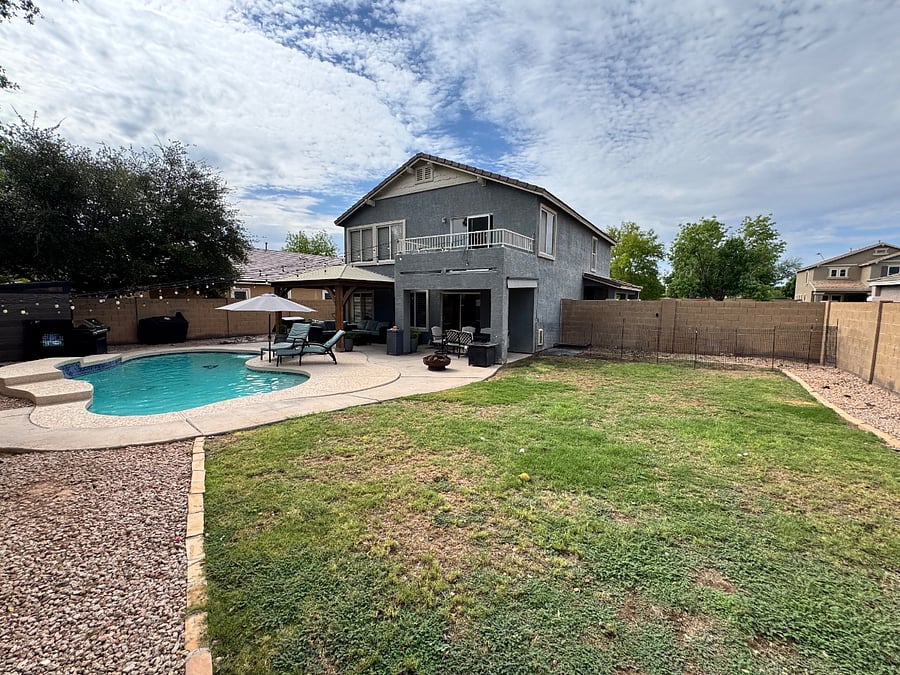 Large back yard with Pool, grills, and dog run