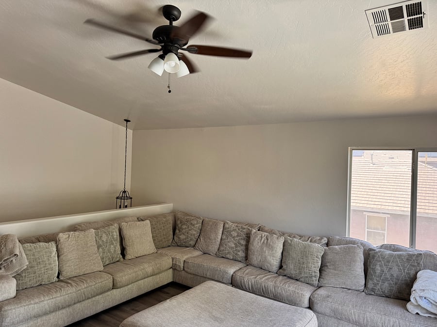 Family Room with XL cozy sectional with TV, board games