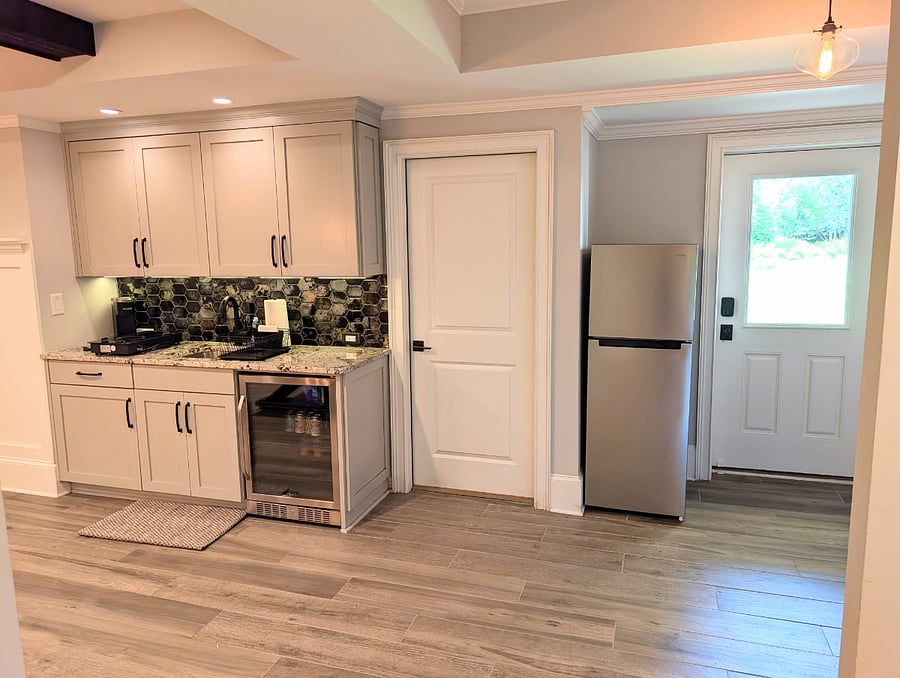 Your private kitchenette (10.1 cu. ft fridge, induction cooktop, coffee maker pictured.  Not pictured- microwave, multi-function mini oven, pellet ice maker)