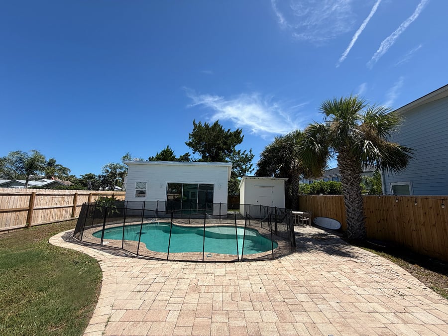 View from back door of pool and detached office/gym space 