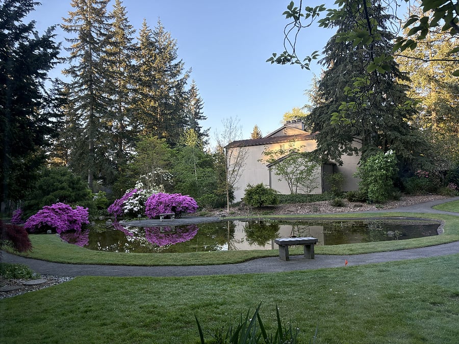 The condo is located along a walking path that winds through six acres of beautifully landscaped grounds, mature trees, ponds, and gardens. Many residents enjoy the path for a daily walk or fitness.