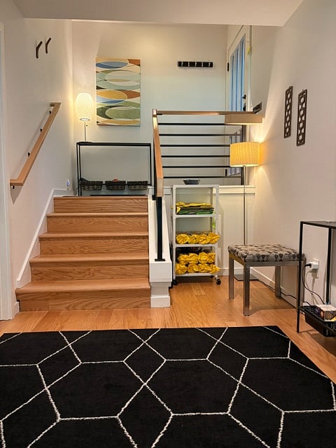 The entry opens to a spacious, single-level condo with an open floor plan and no interior stairs.