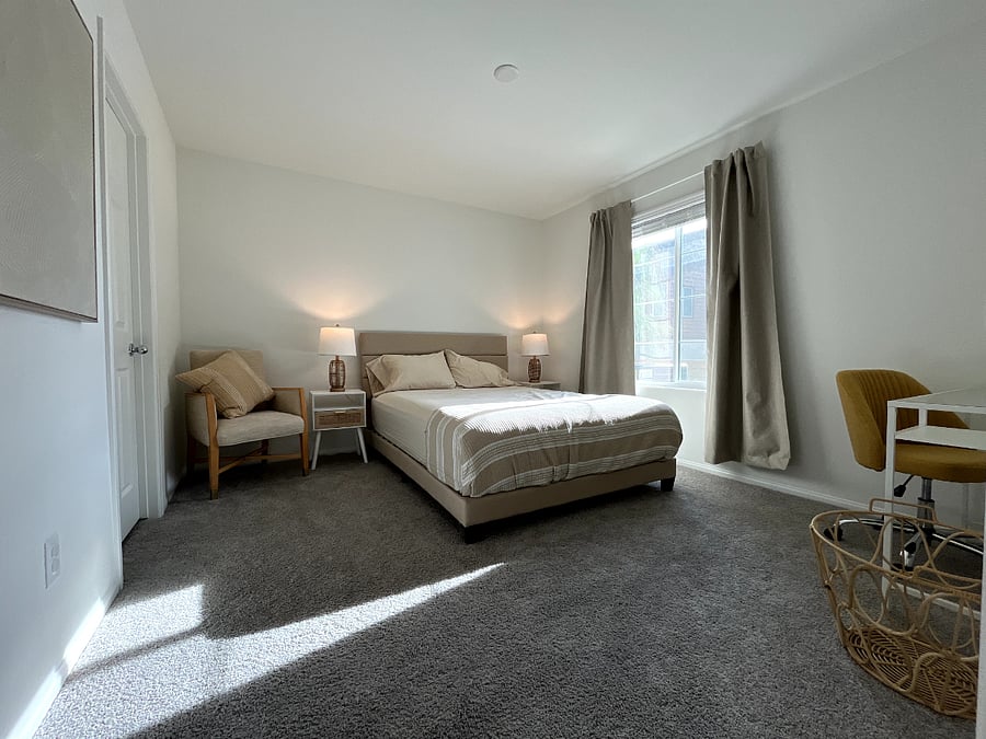 Ensuite Master Room with queen bed, blackout curtains and walk-in closet