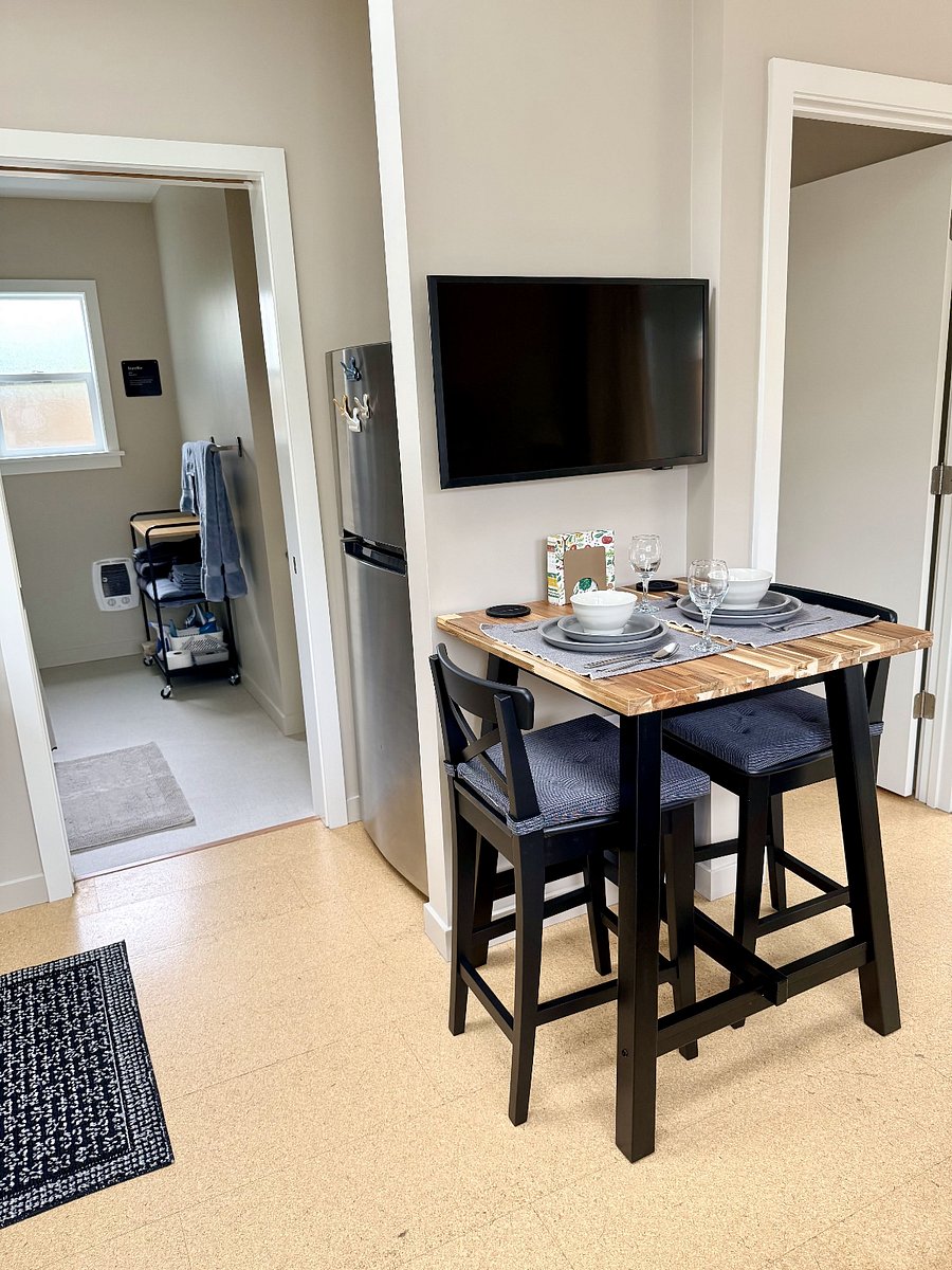 Kitchen/dining area leads into the bathroom.